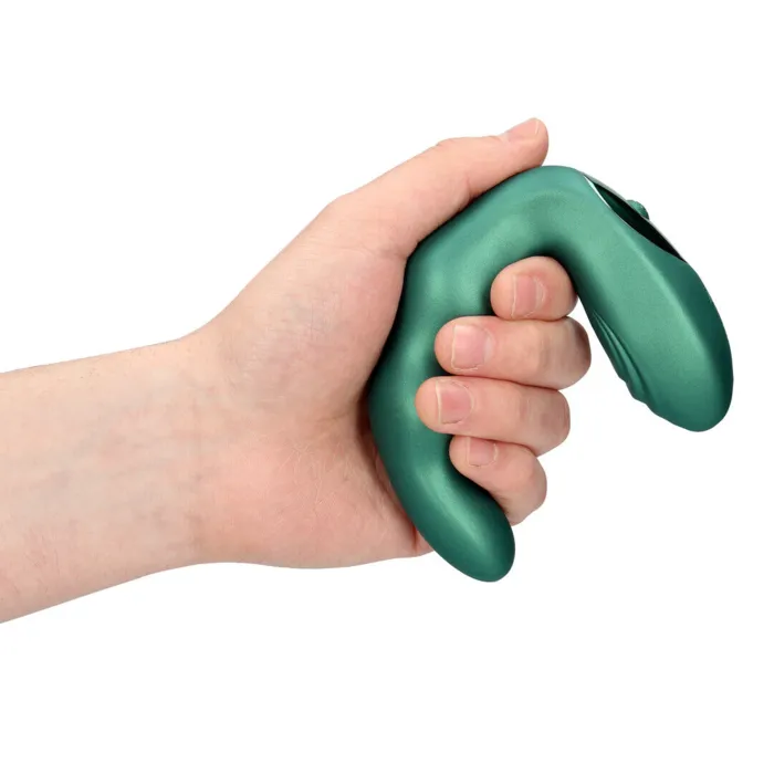 Fjernbetjent prostatavibrator i hånden